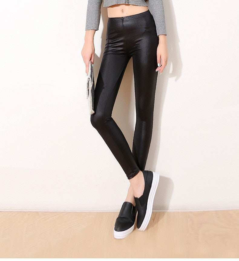 Sleek faux leather leggings styled for a casual look.