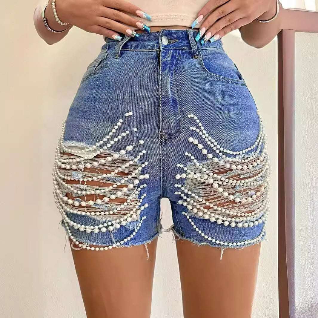 High Waist Denim Shorts with pearl embellishments.