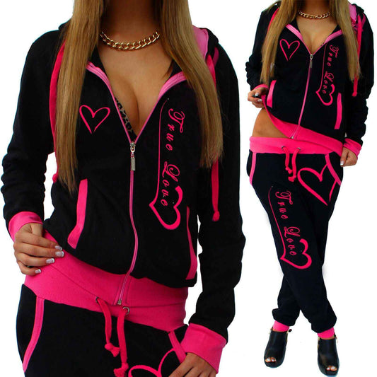 Glow Chic's Knitted Sportswear Suit in black and pink with heart design, made from spandex.