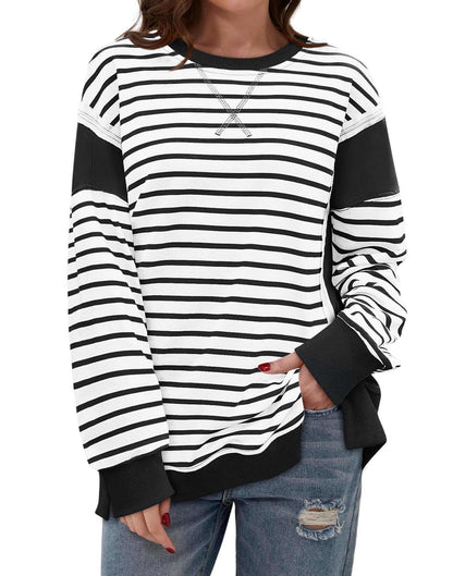 Striped black and white sweatshirt, casual and stylish design.