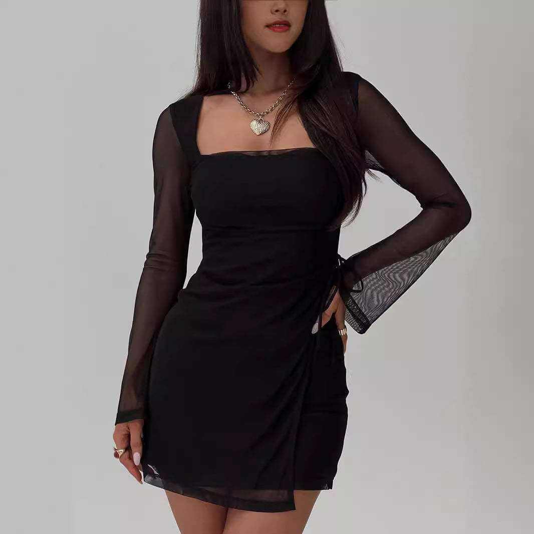 Black lace-up long sleeved dress with sheer sleeves and flattering fit.