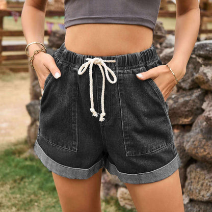 Denim shorts with trendy tied curling design and comfortable fit.